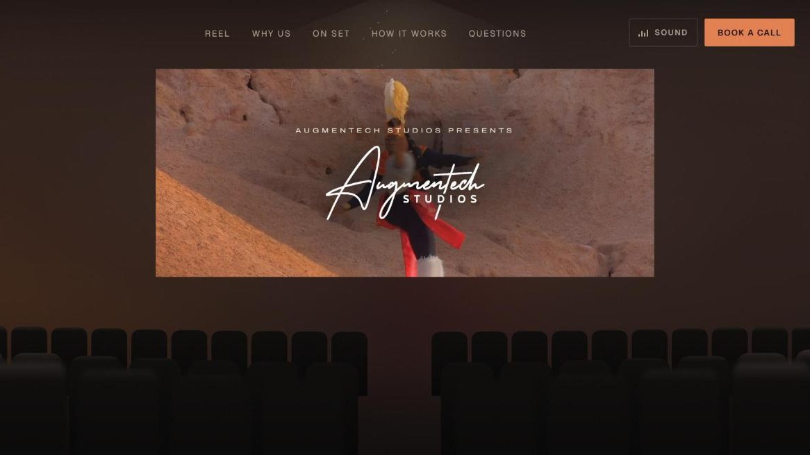 The Augmentech Studios homepage, showing its showreel on a cinema screen above rows of theatre seats